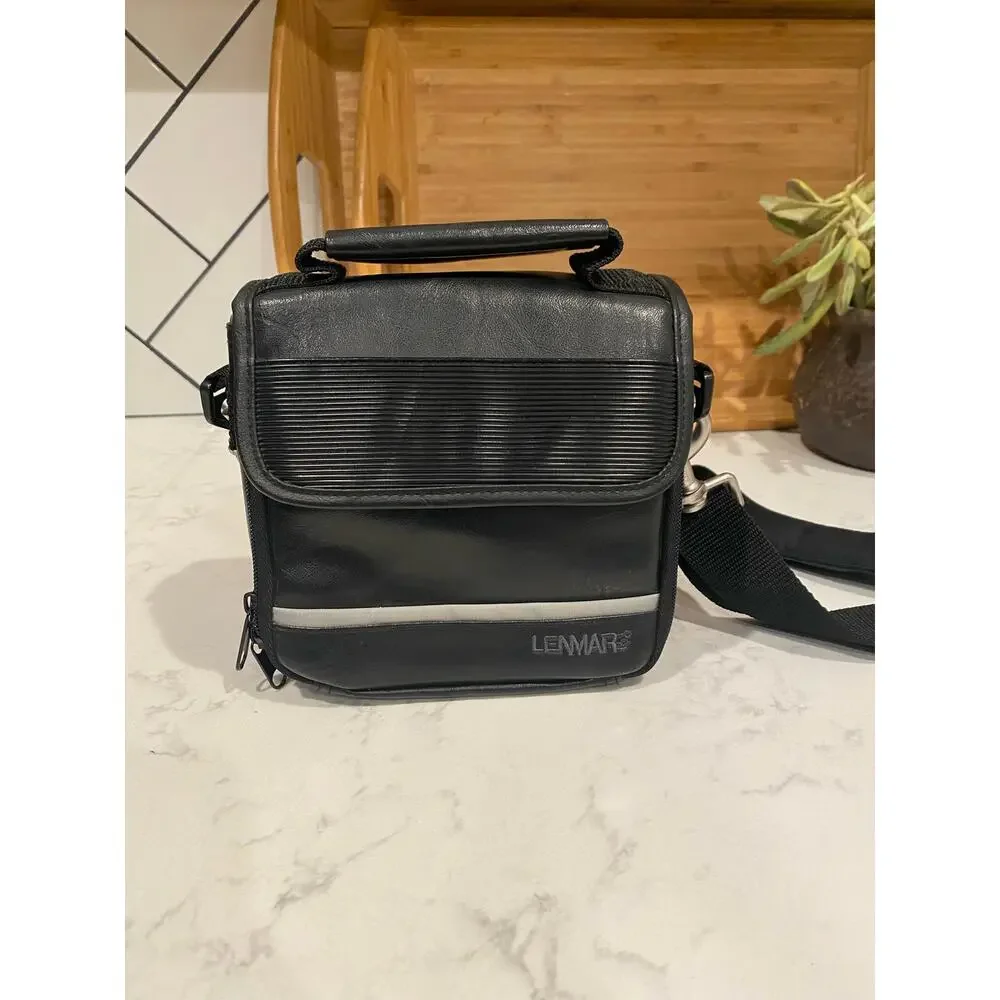 Lenmar faux leather shoulder camera bag hand held or shoulder strap vintage?